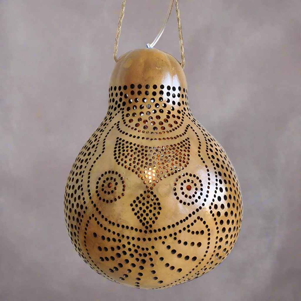 Brighten up your home with our exquisite Dokra Arts Handcrafted Bottle Guard Lamp