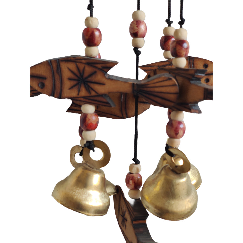 Handcrafted windchime with wooden fishes hanging on it