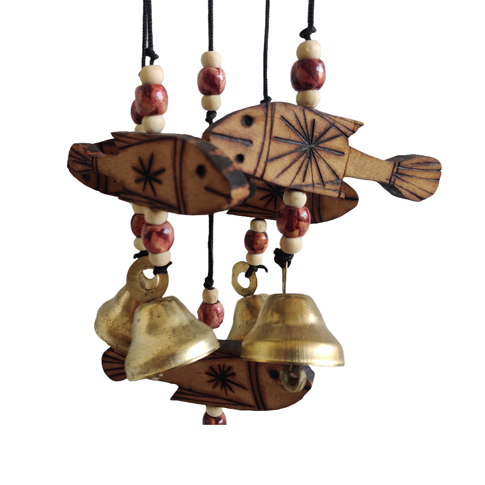 Handcrafted windchime with wooden fishes hanging on it